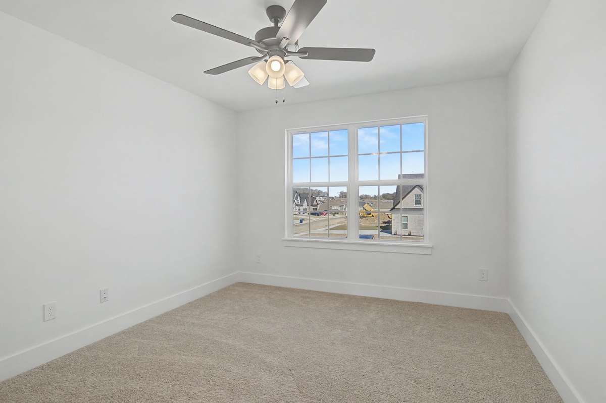 Photos of same floor plan but of another finished home in Oak Meadows by Surrey Homes. Photos are for illustration purposes only. Colors and materials may vary.