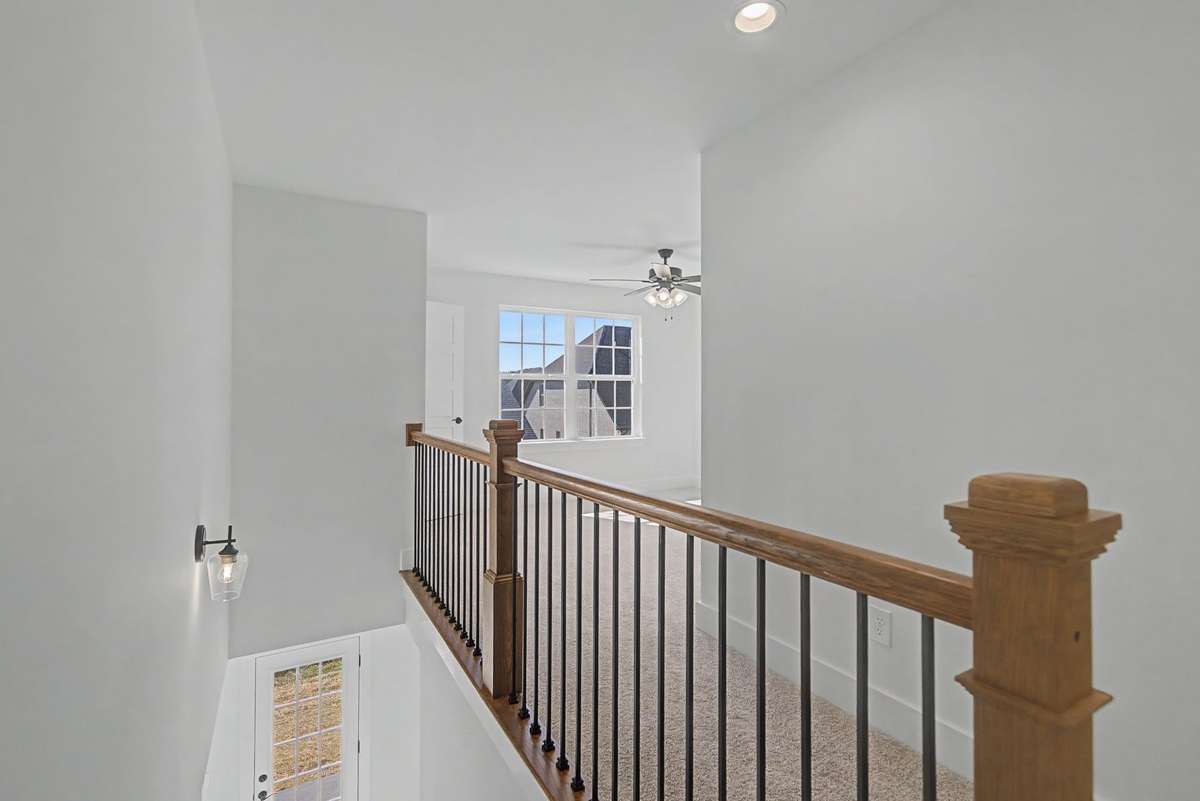Photos of same floor plan but of another finished home in Oak Meadows by Surrey Homes. Photos are for illustration purposes only. Colors and materials may vary.