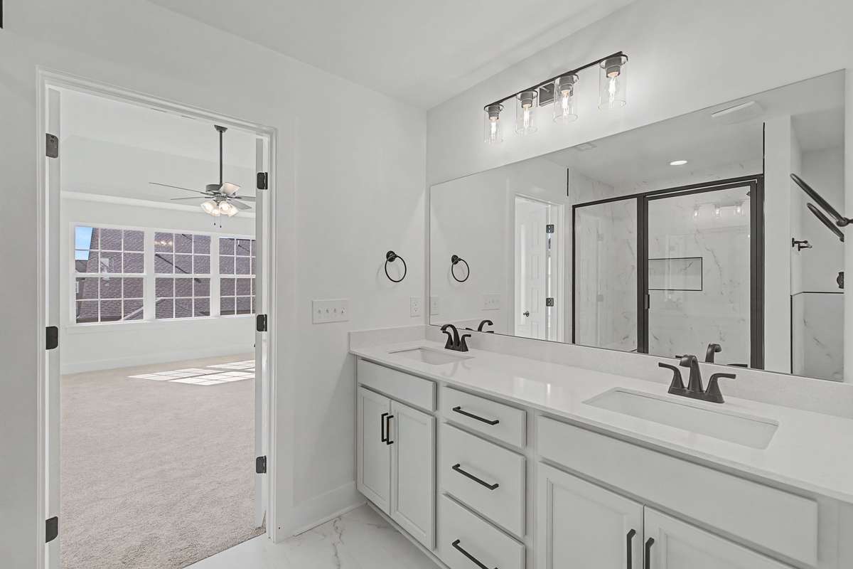 Photos of same floor plan but of another finished home in Oak Meadows by Surrey Homes. Photos are for illustration purposes only. Colors and materials may vary.