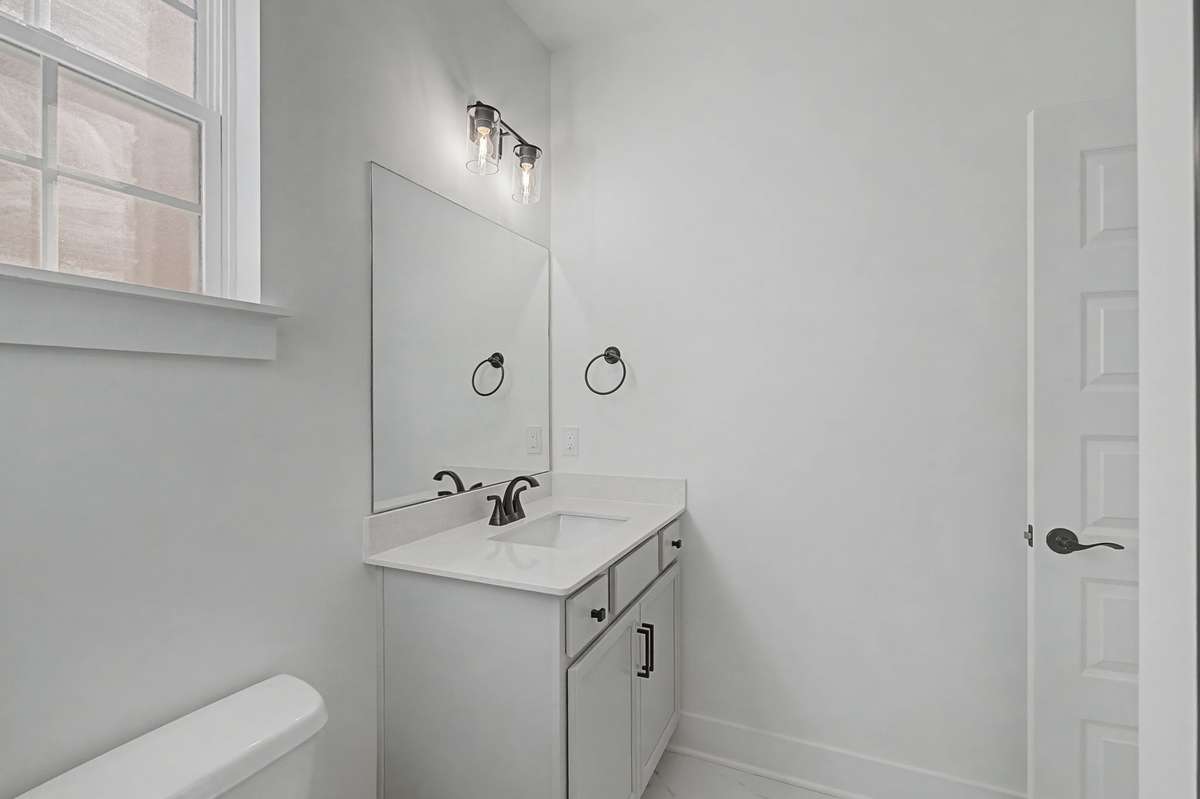Photos of same floor plan but of another finished home in Oak Meadows by Surrey Homes. Photos are for illustration purposes only. Colors and materials may vary.