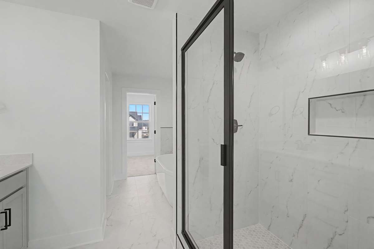 Photos of same floor plan but of another finished home in Oak Meadows by Surrey Homes. Photos are for illustration purposes only. Colors and materials may vary.