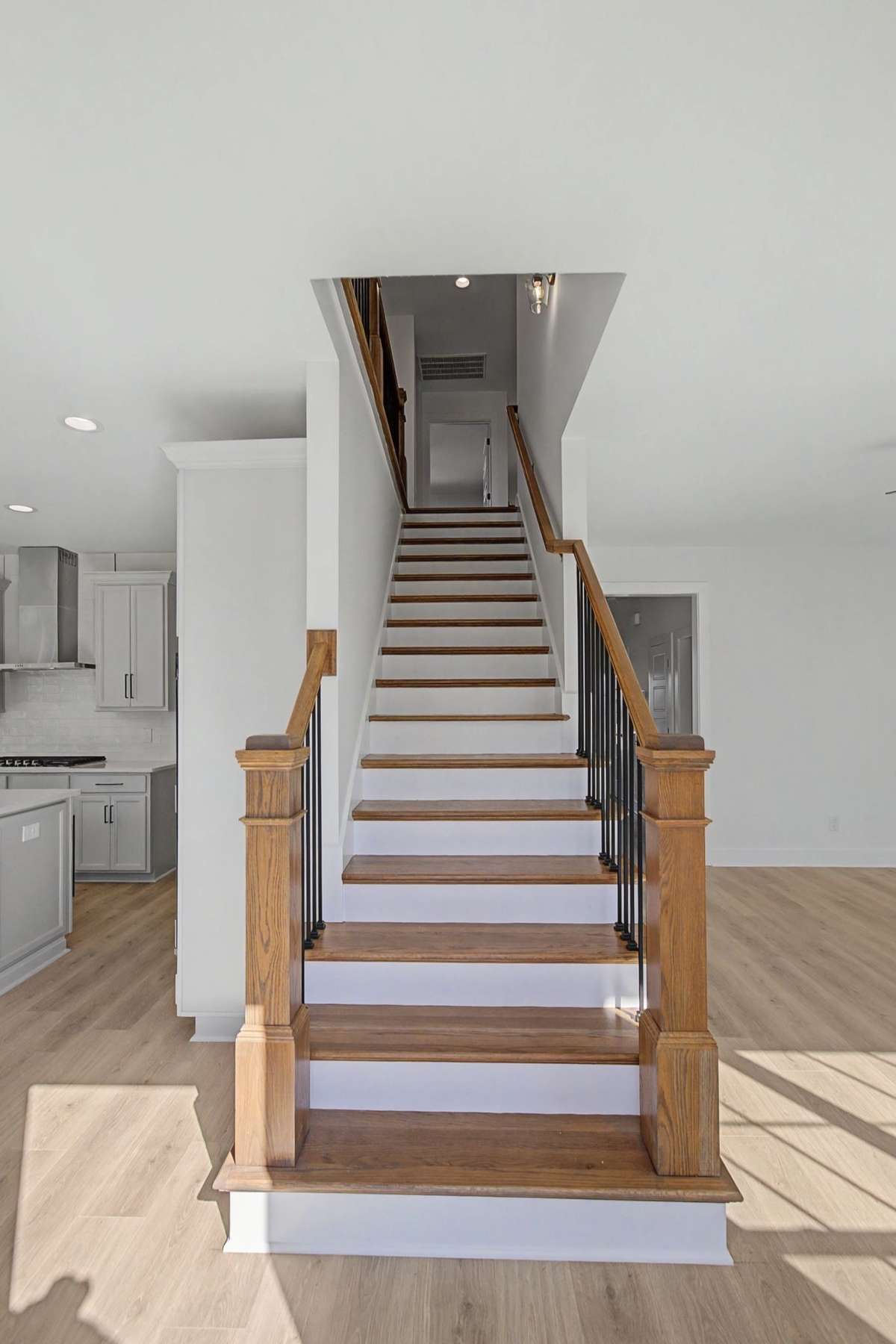 Photos of same floor plan but of another finished home in Oak Meadows by Surrey Homes. Photos are for illustration purposes only. Colors and materials may vary.