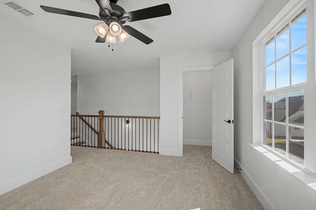 Photos of same floor plan but of another finished home in Oak Meadows by Surrey Homes. Photos are for illustration purposes only. Colors and materials may vary.