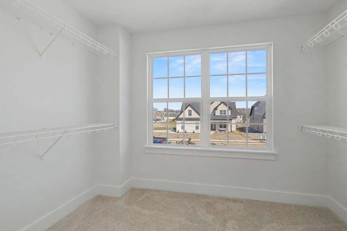 Photos of same floor plan but of another finished home in Oak Meadows by Surrey Homes. Photos are for illustration purposes only. Colors and materials may vary.