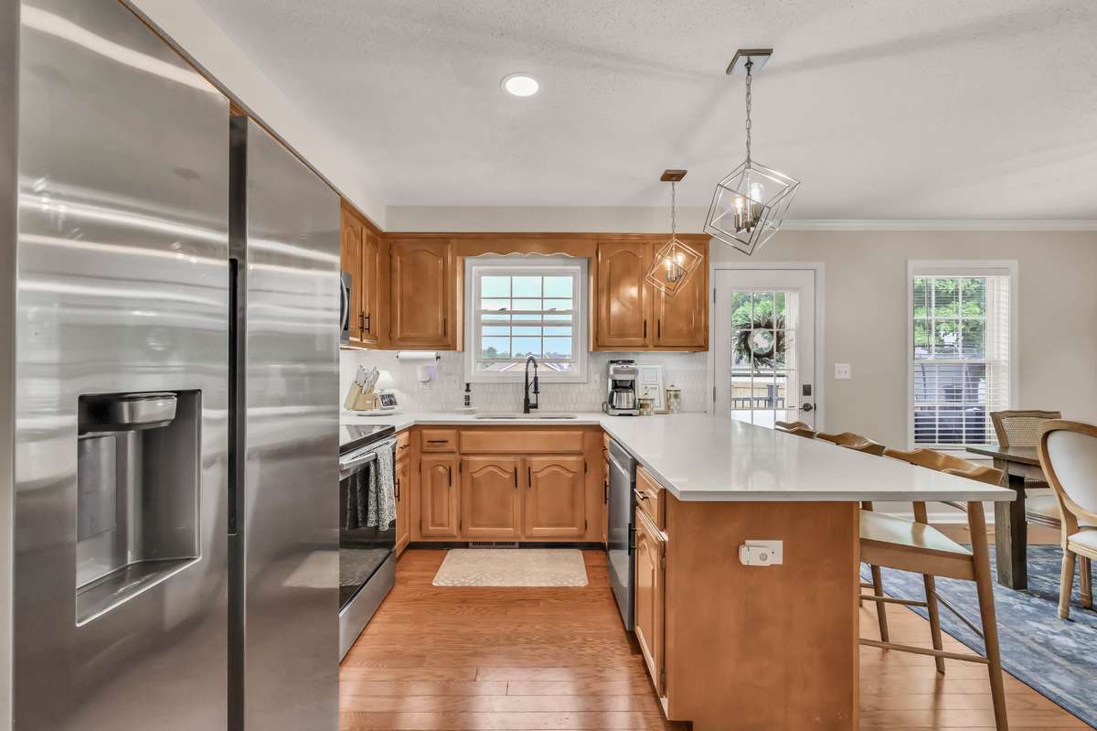 Quartz counters + tile backsplash