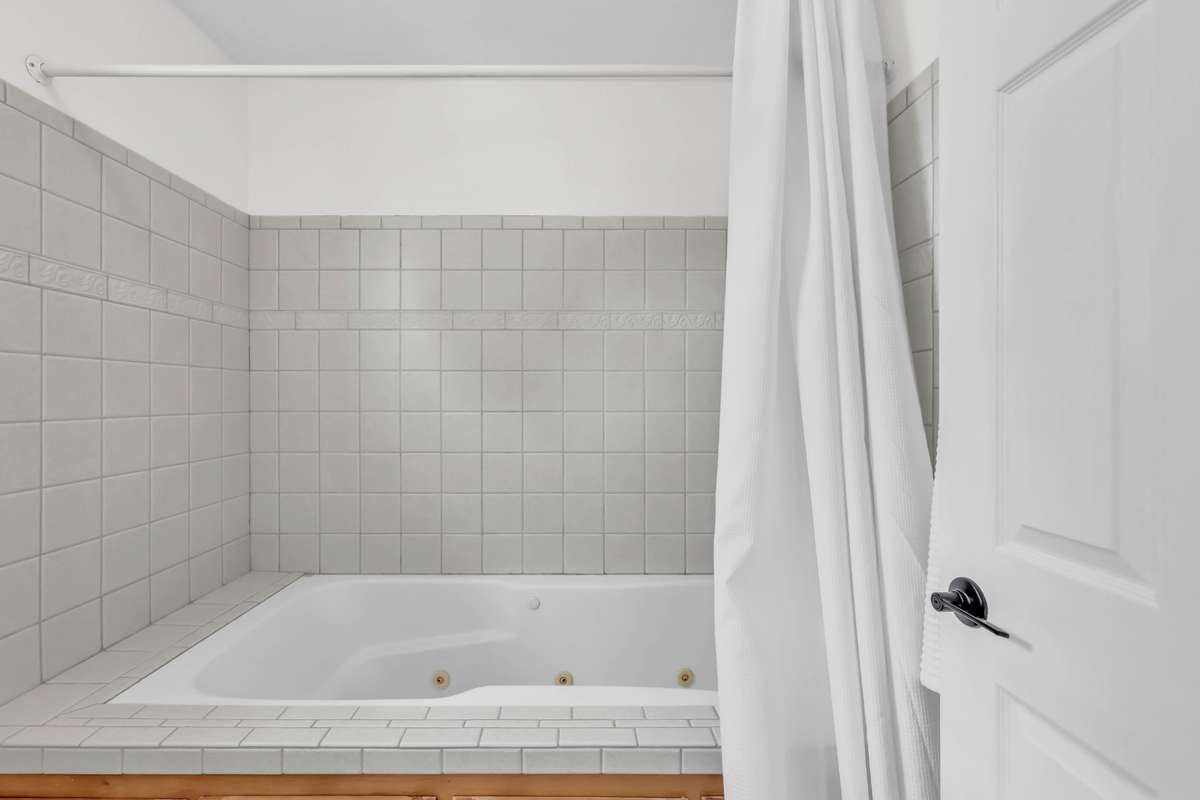 Large jetted tub in the primary bathroom
