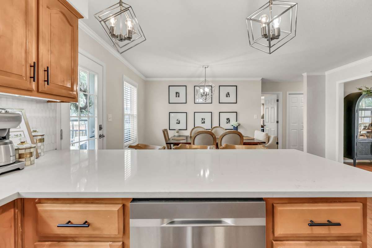 The kitchen flows seamlessly into the dining space