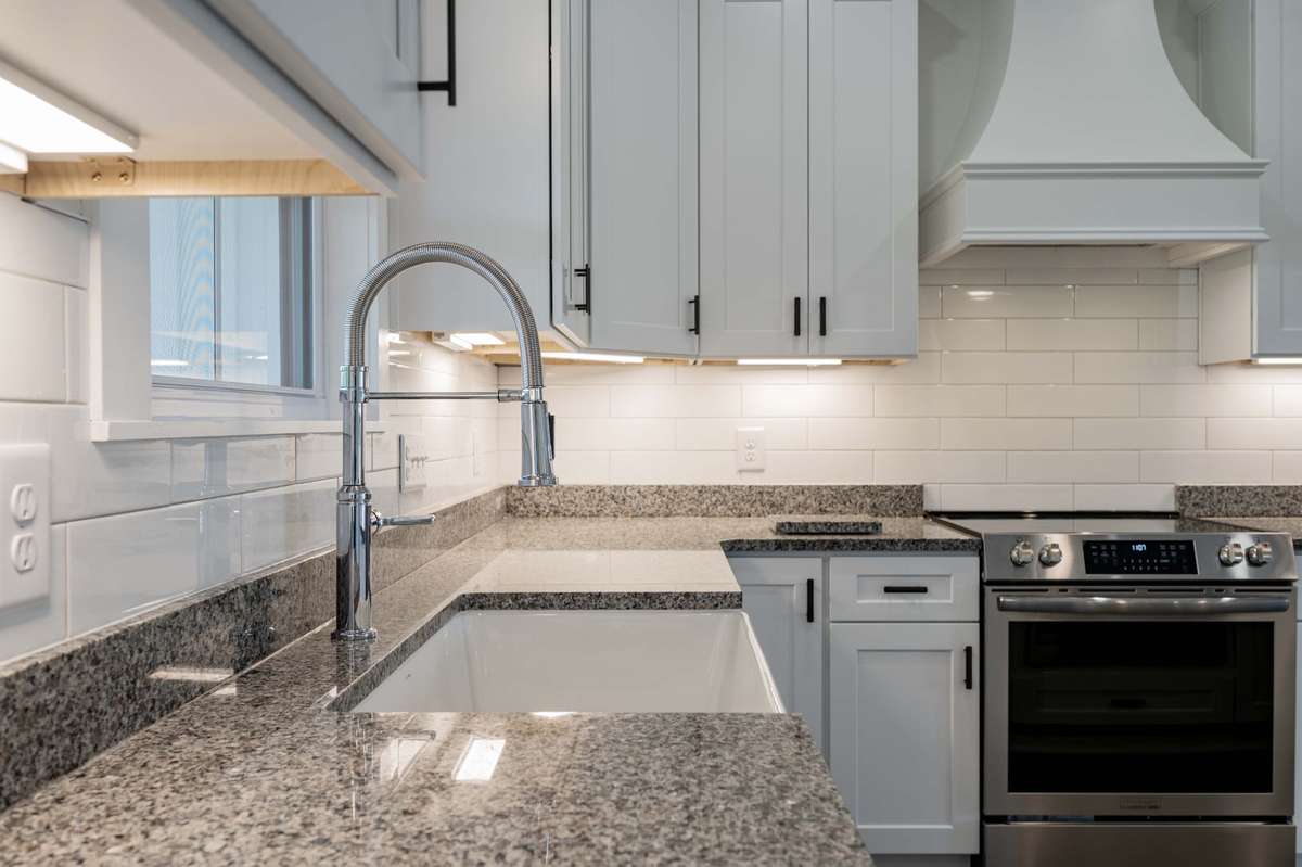 Farm House Sink and Unser the Cabinet Lighting