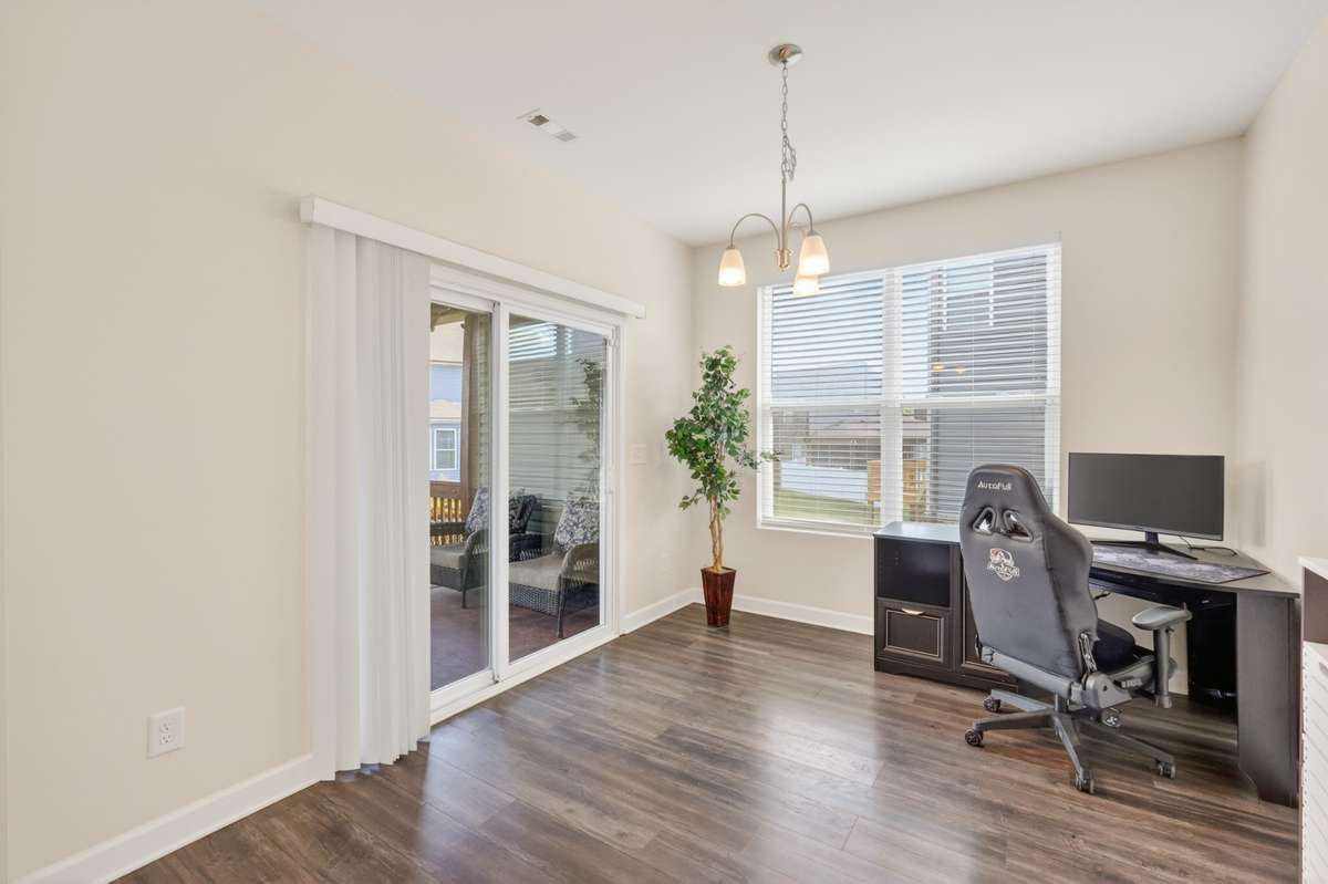 Formal Dining Room, or Flex Room, or Office featured in this photo-- located on main level.
