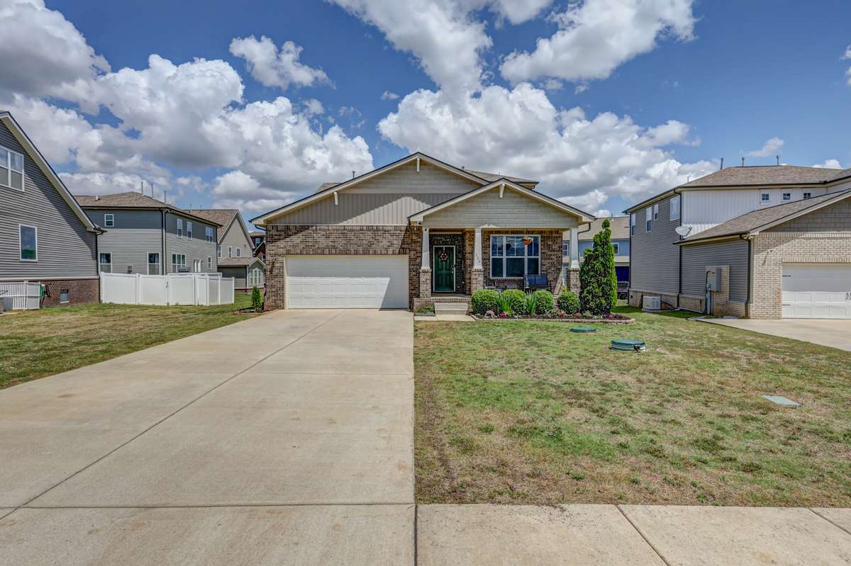 Features 2-car garage, and enough extra parking to easily accommodate 4 additional vehicles!