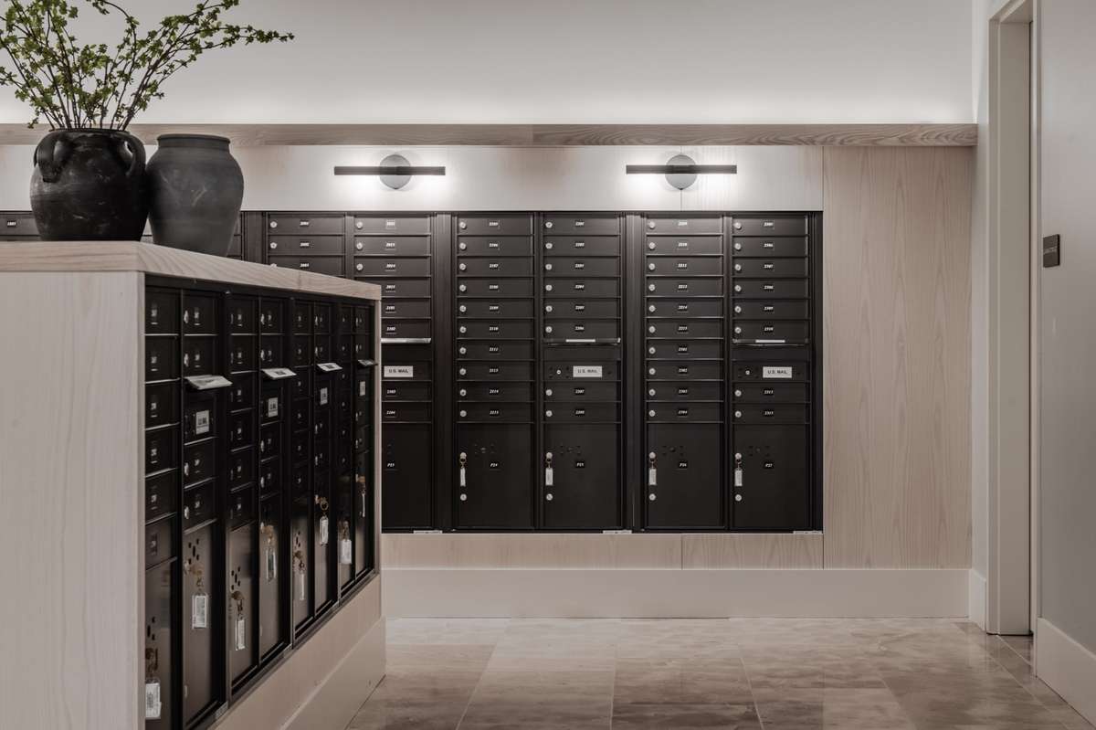 Large mail room and Luxer package storage spaces in the lobby.