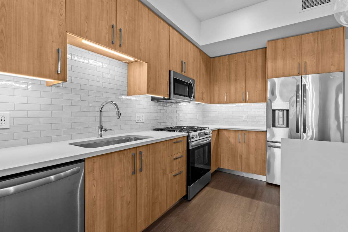 All appliances convey, including a rare gas cooktop—an uncommon and highly sought-after feature in Nashville high-rise living.
