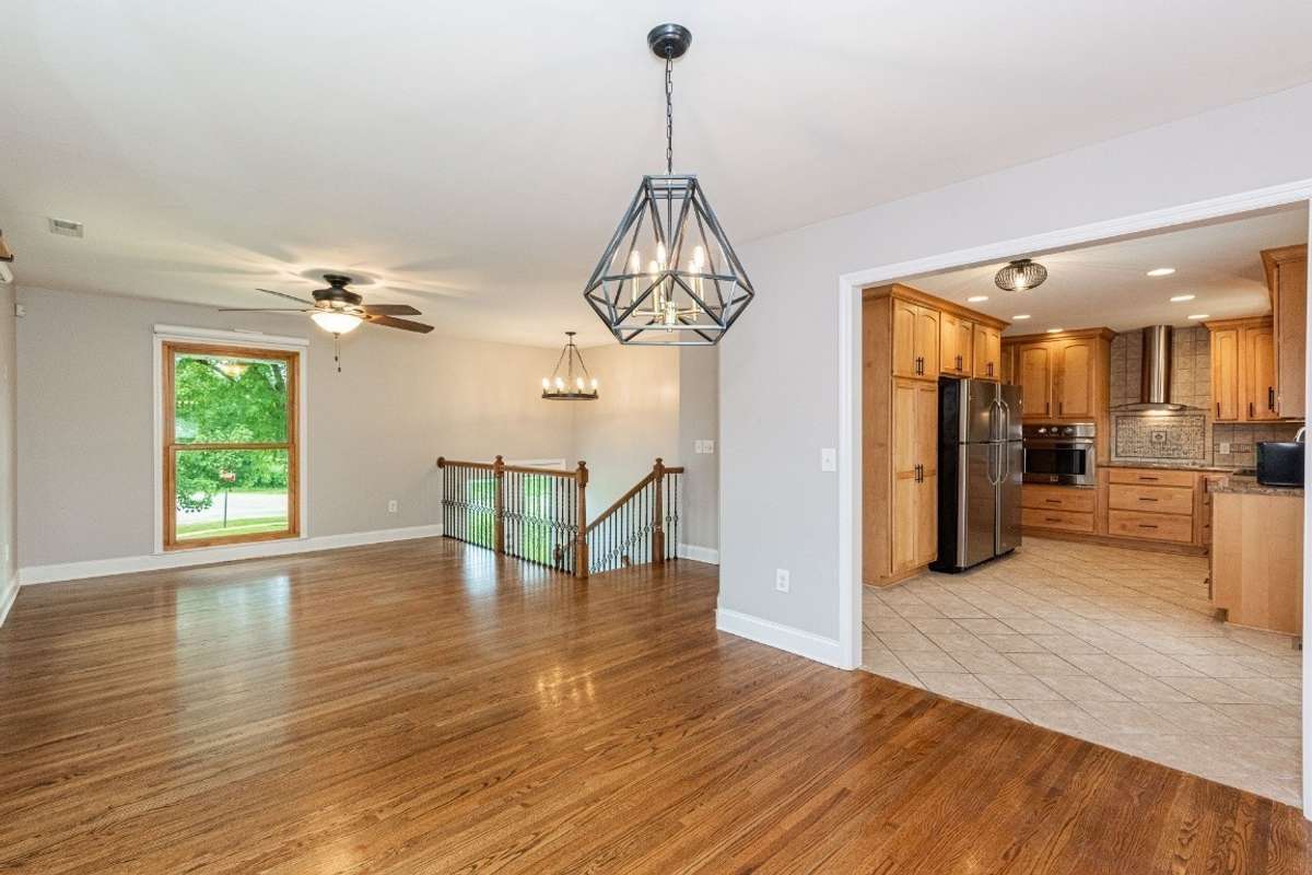Living room Dining combination with 2 entries to kitchen