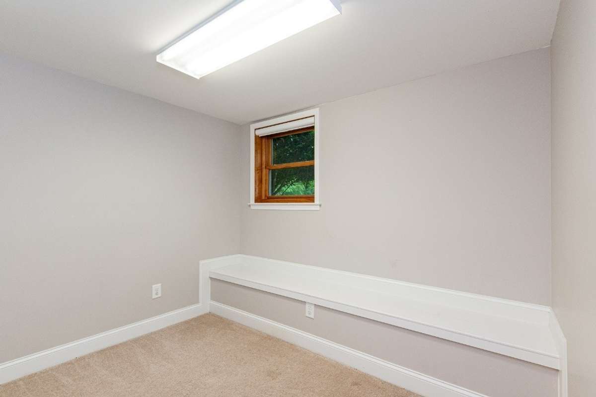 Another bedroom with wall seat