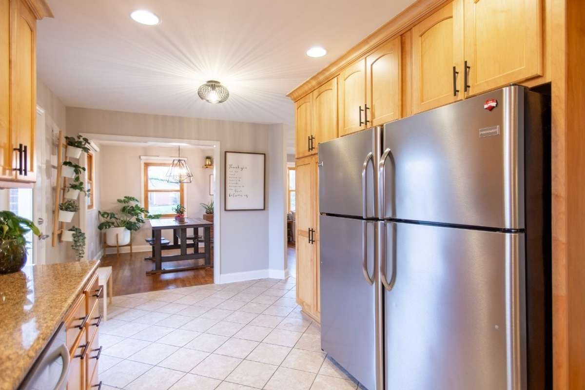 2 large refrigerators and a large pantry with extending, rotating, space