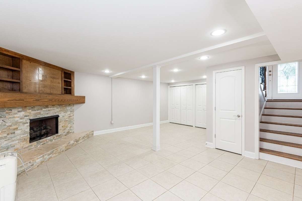 Large den area with gas fireplace.