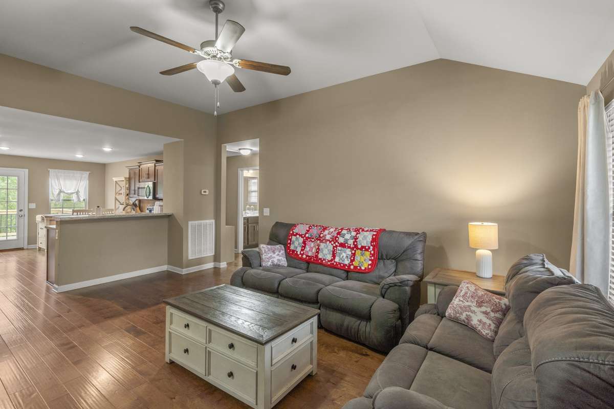 Elevated ceilings welcome you in to this inviting great room