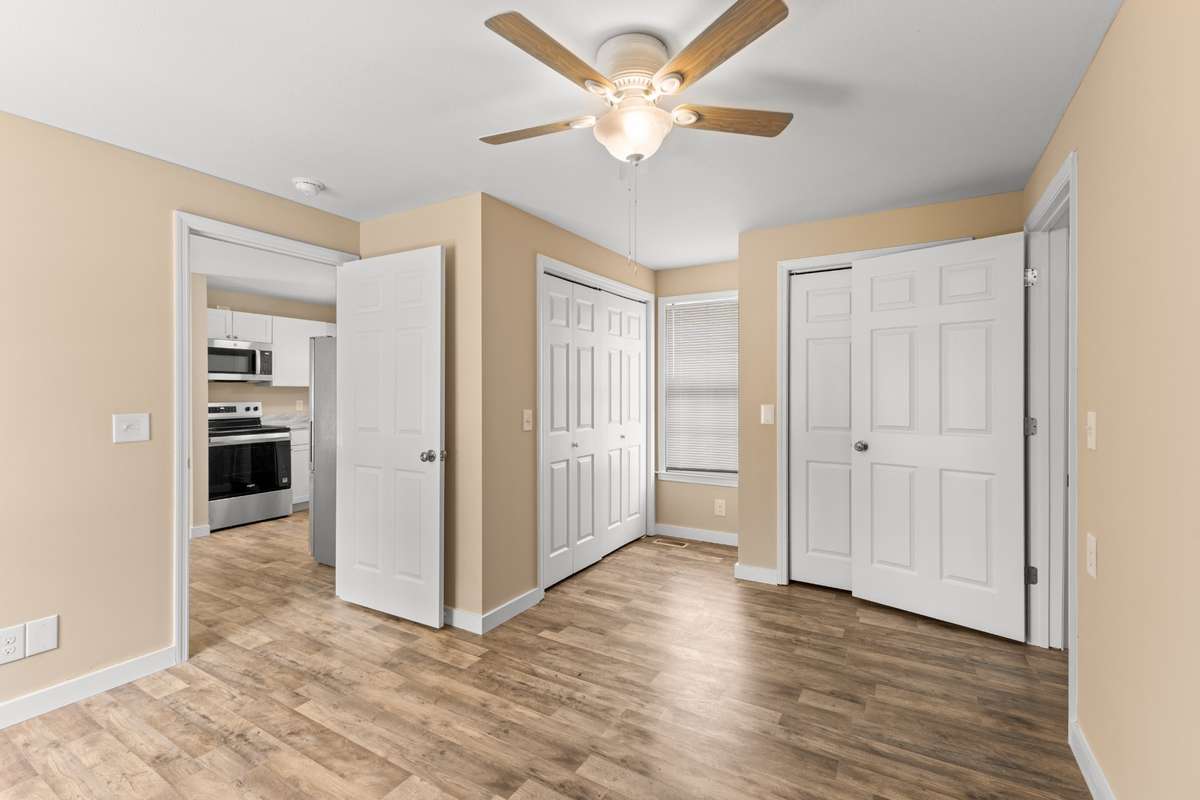 Bedroom 4 (addition primary) has 2 closets - one houses the water heater and washer & dryer hook ups (electric water heater). The door to the right leads to another full bath and bonus room.