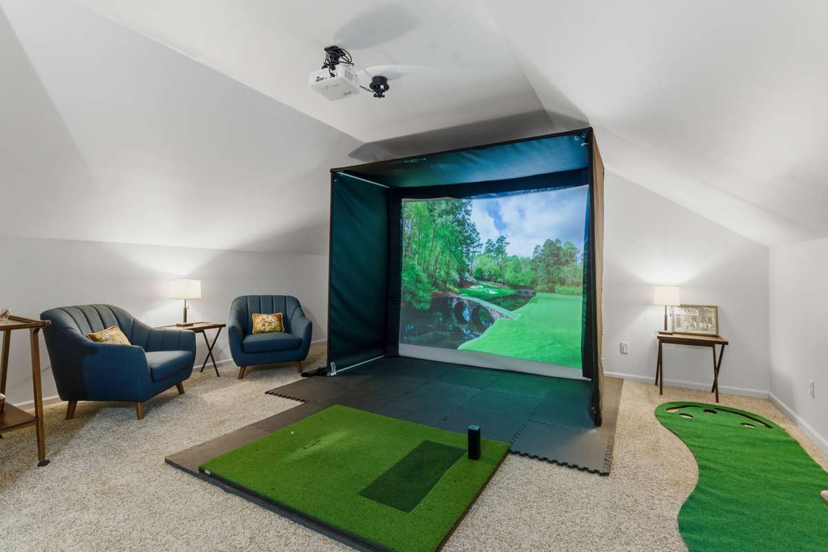Golf simulator in the bonus loft can stay with the house