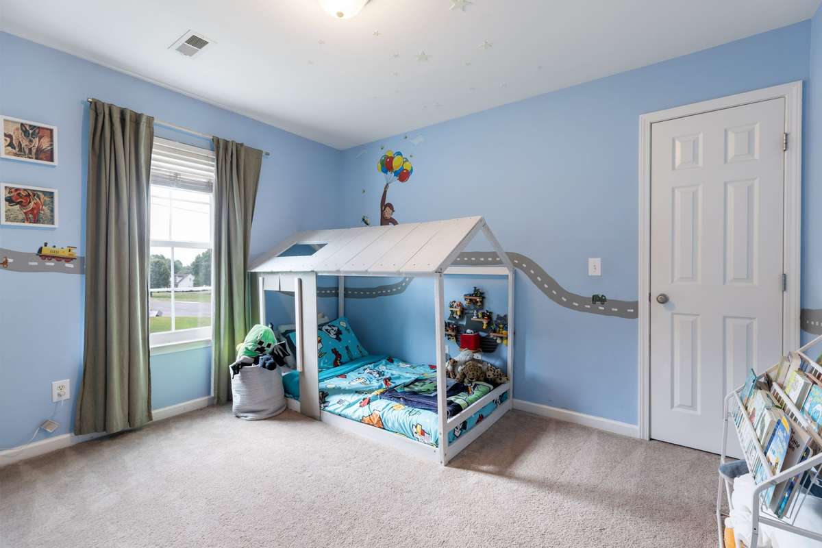 Secondary Bedroom upstairs with Walk-In Closet