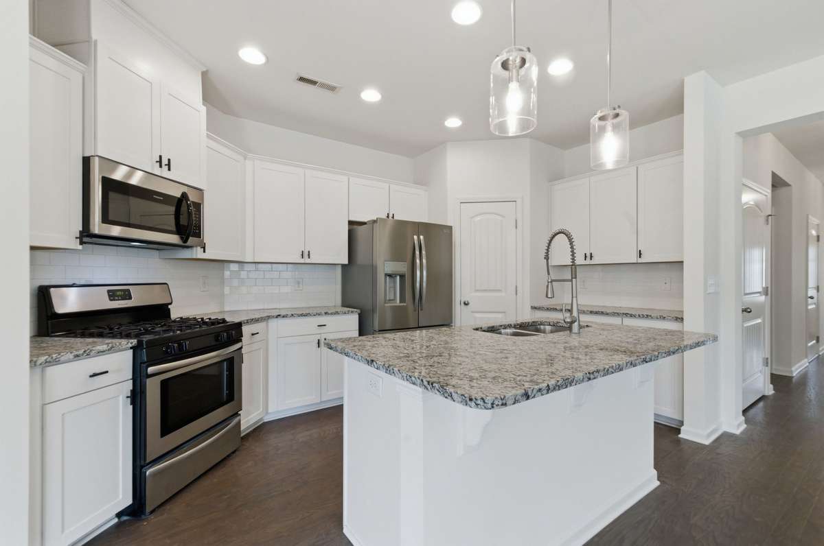 Plenty of room on these granite counters for cooking and entertaining--or just a quiet cup of coffee in the morning.