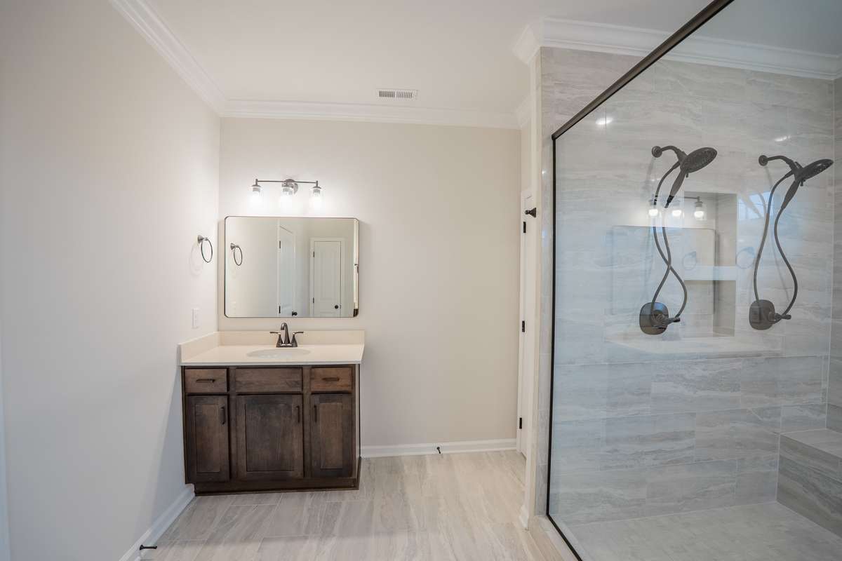 EXAMPLE >>>2 Separate Vanities and a Toilet Room!