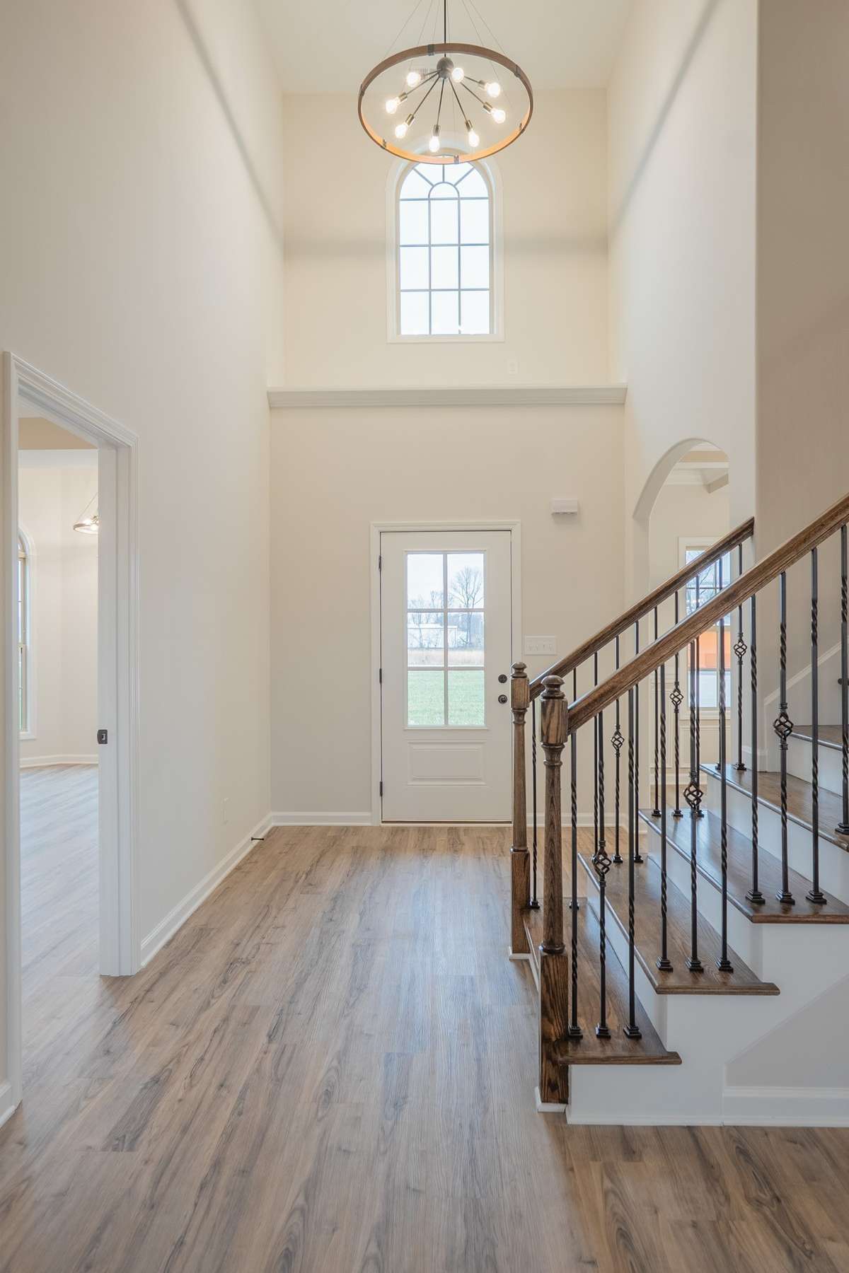 EXAMPLE >>> 2 Story Entry Foyer with an Elegant Chandelier!