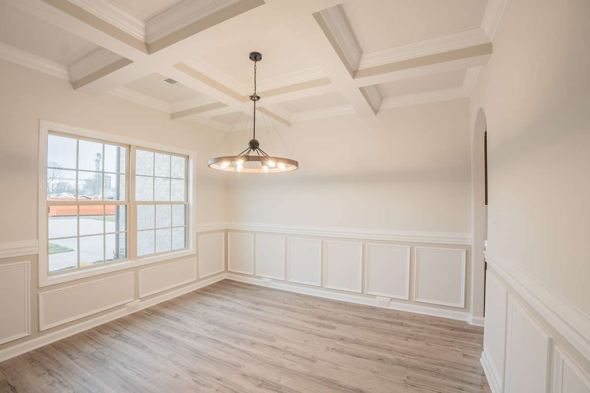 EXAMPLE >>>Large Formal Dining Room with Chair Railing, Wainscoting and a Coffered Ceiling!