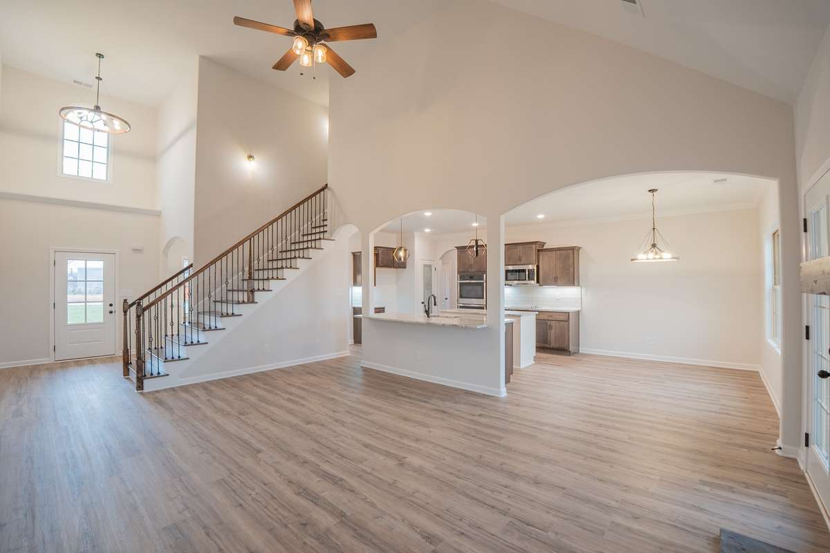 EXAMPLE >>>Open Layout Downstairs and SPC Flooring Throughout the Foyer, Living Room, Kitchen, Eat-In Area and Formal Dining Room!