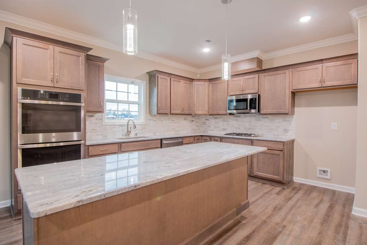 EXAMPLE>>>Open Kitchen with a HUGE 8' Island, Cooktop, Smart Double Oven, Microwave that Vents Outside, Granite Tops, Walk-in Pantry and Tons of Cabinetry - All with Soft Close Doors & Drawers!!