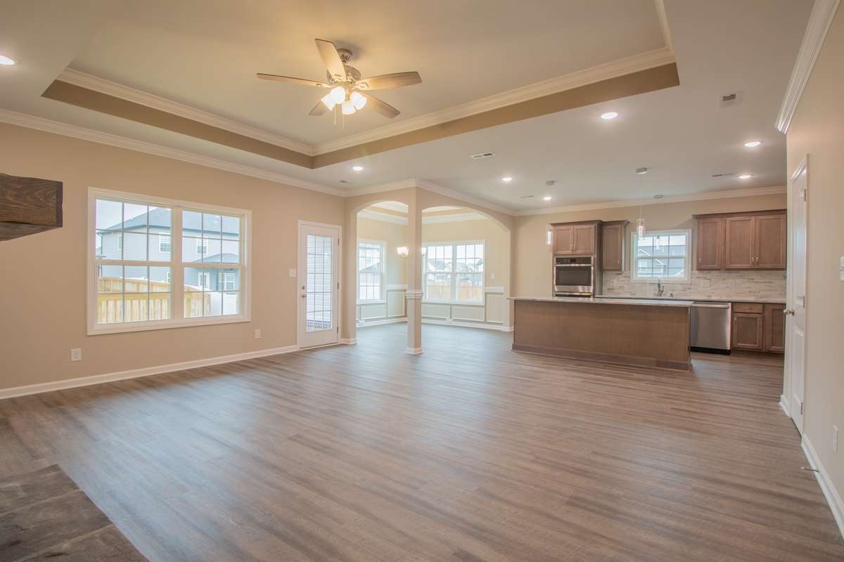 EXAMPLE>>>Living Room is Open to the Kitchen and has Access to the Covered Patio!!