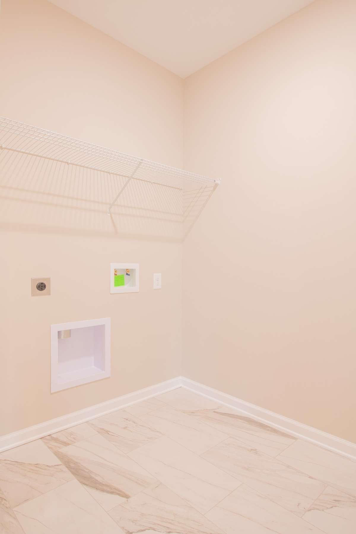 EXAMPLE>>>Spacious Laundry Room with Tile Flooring and Shelving!