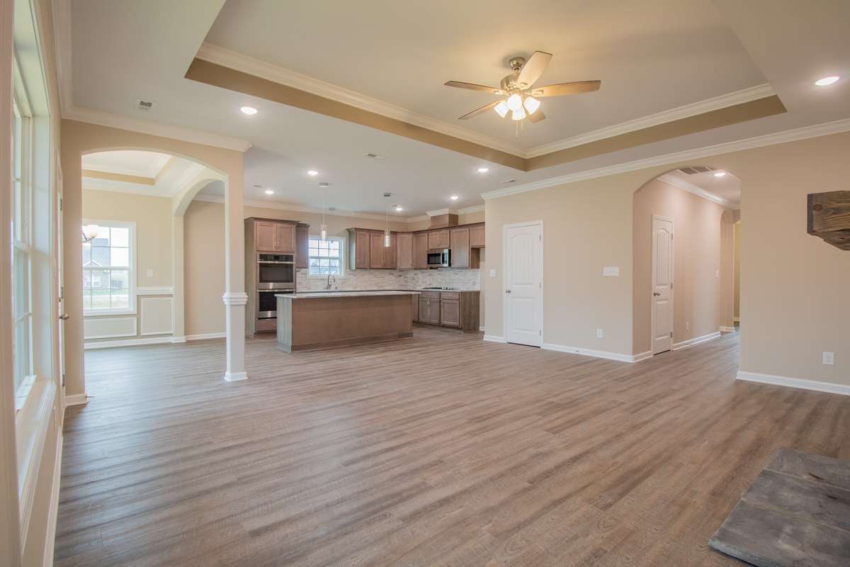 EXAMPLE>>>Open Layout in the Main Living Areas and SPC Flooring Throughout the Foyer, Hallways, Living Room, Kitchen and Dining Room!