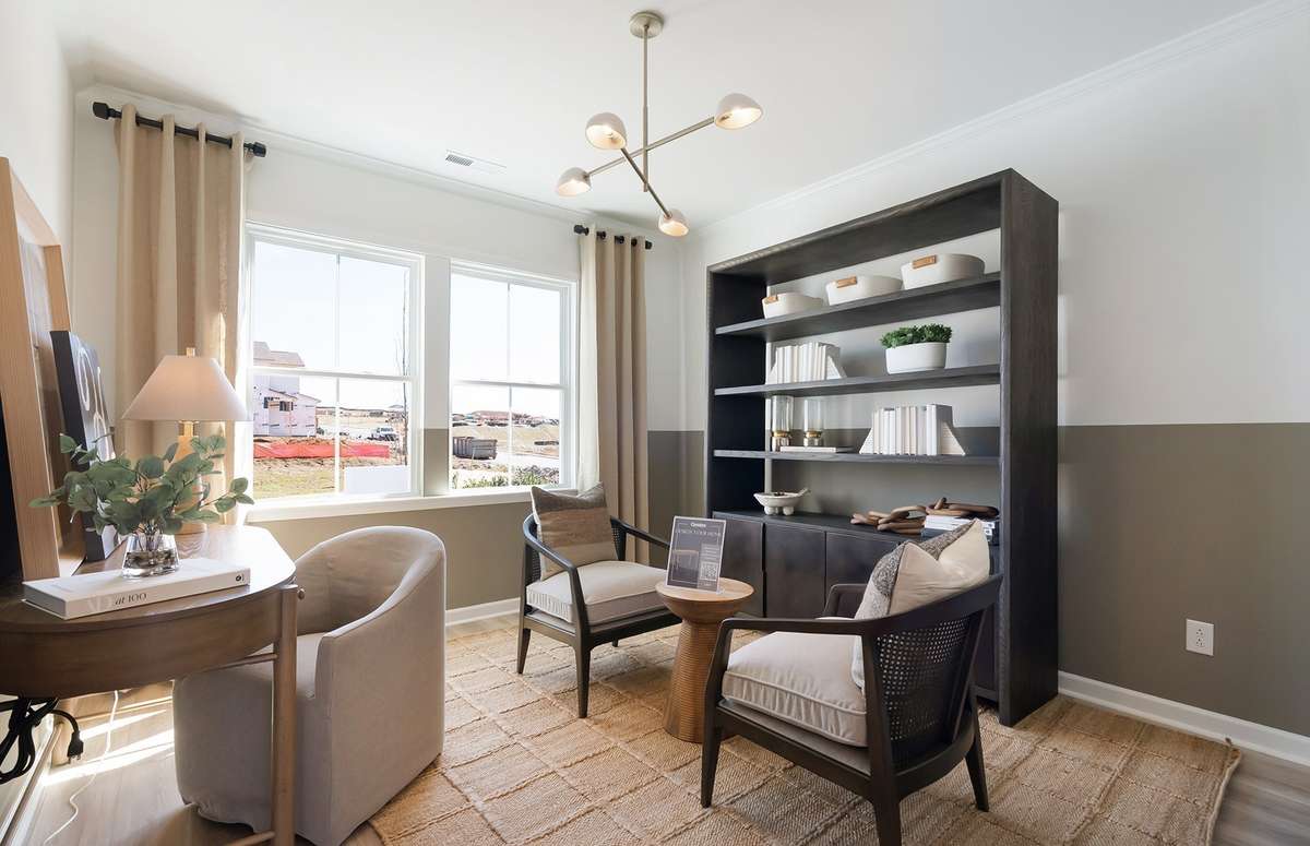 ***Photo is from a brand new Rosella Model home*** Located on the 1st floor, the Flex Space is perfect for those that need a home office or workout room. You can also use this space as a formal dining room as well.