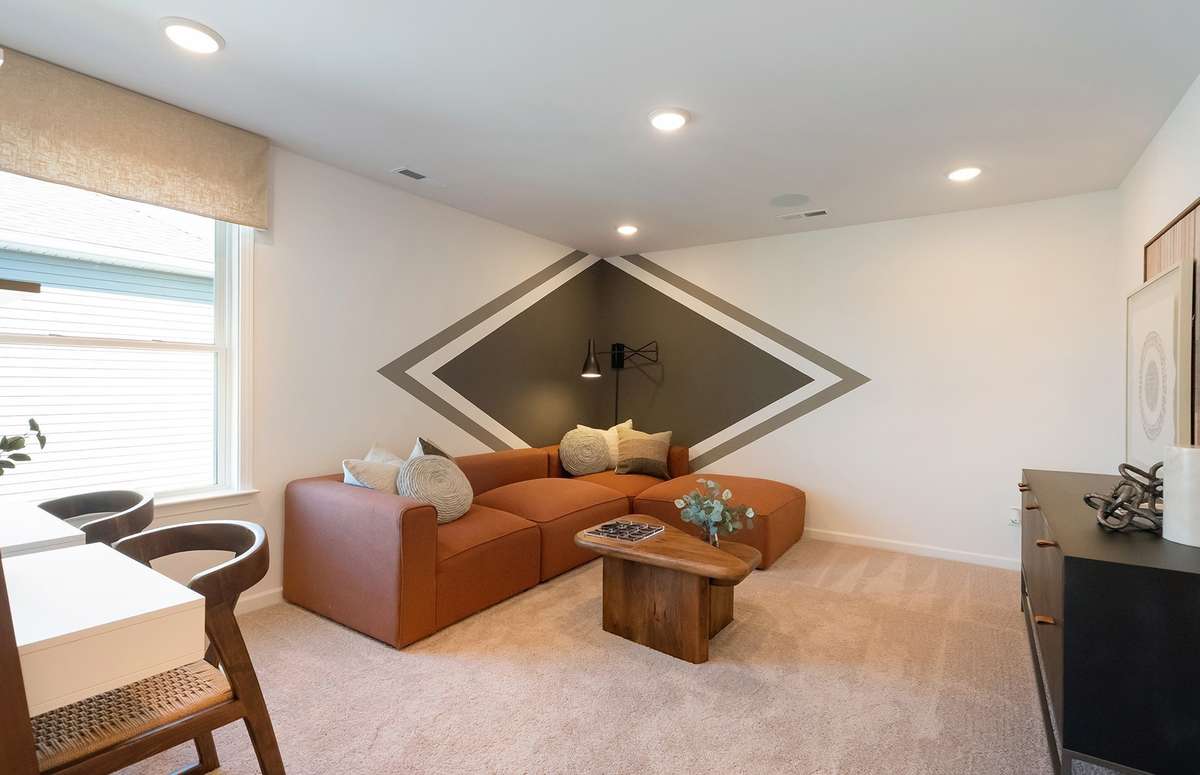 ***Photo is from a brand new Rosella Model home*** The Loft of the 2nd floor would be a great fit for those that need a secondary living space or a playroom.