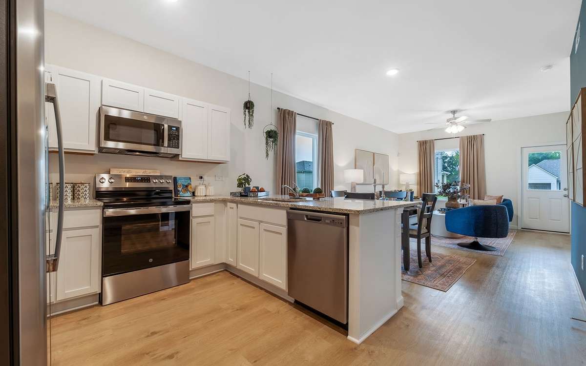 GE Stainless Steel Energy Star Appliances. Includes Fridge with Water/Ice Maker, Microwave Hood, Dishwasher, Stove, Washer/Dryer. Large Walk In Pantry.