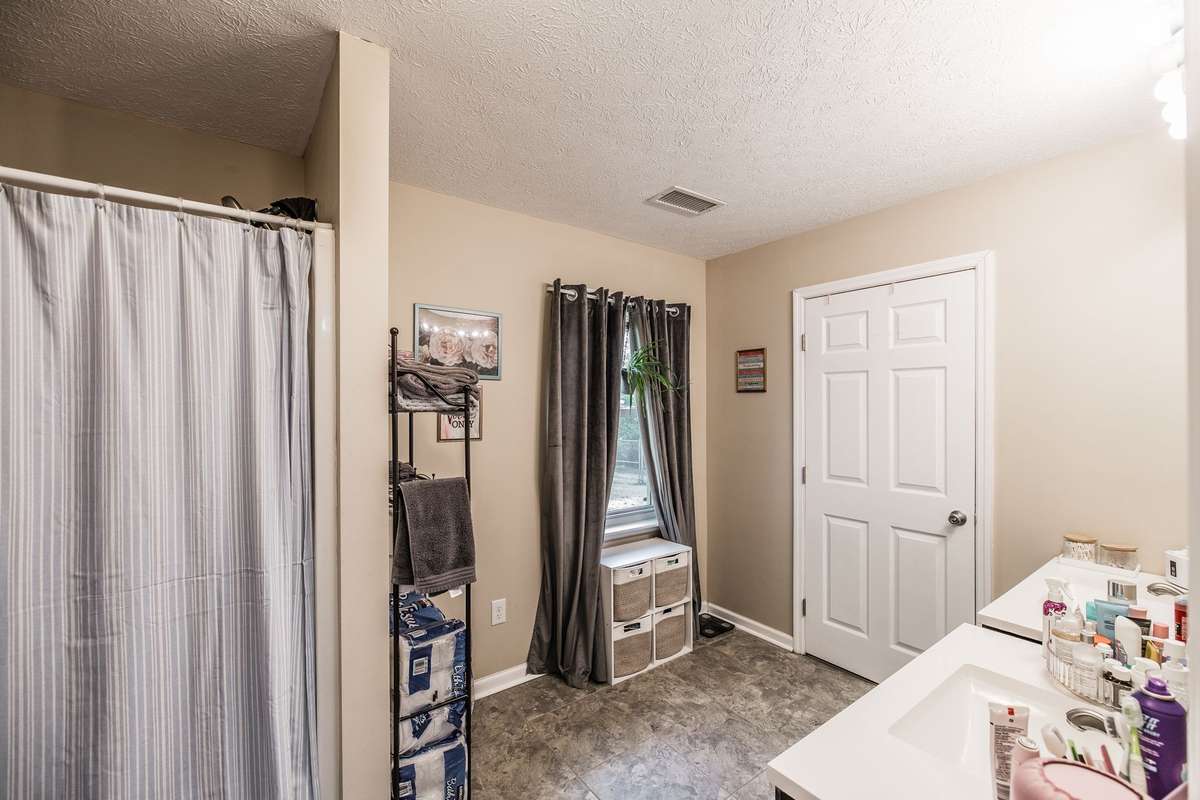 Main bathroom with dual vanities