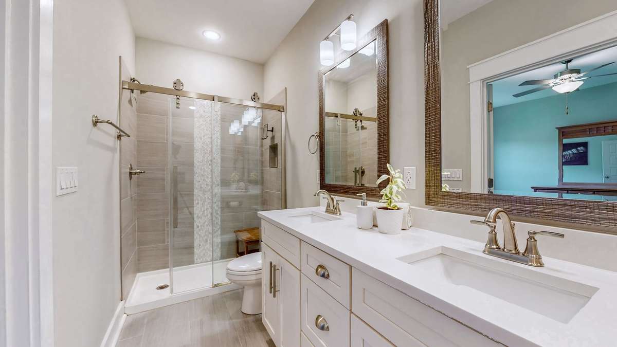 Primary Suite Bathroom features double vanities shower & soaking tub