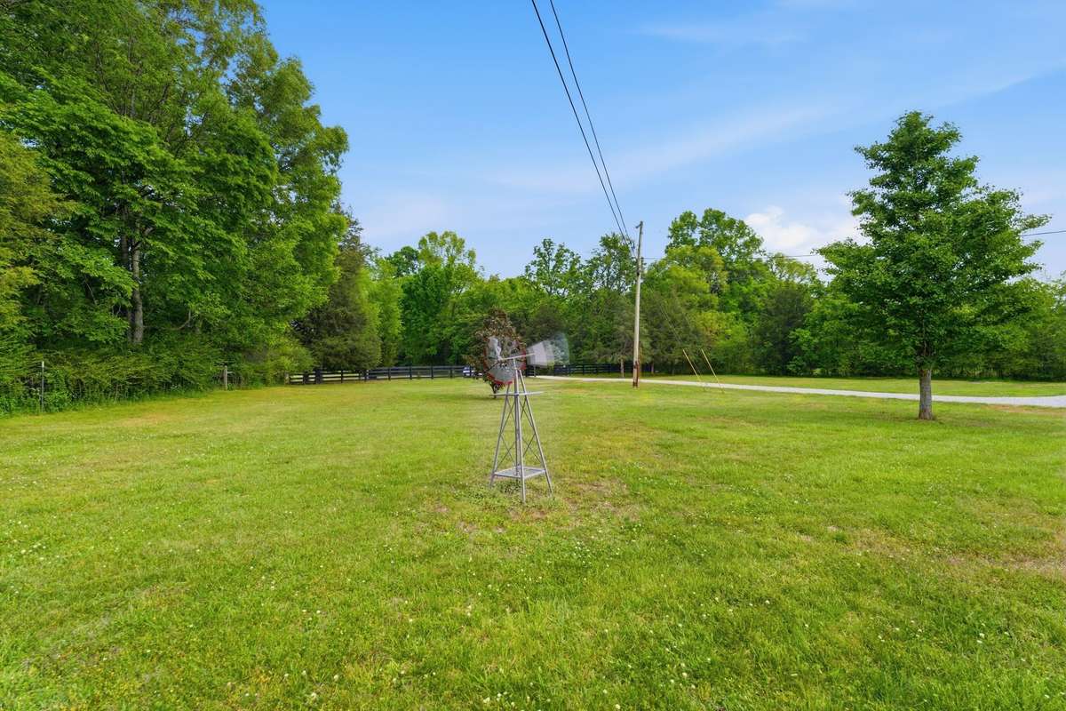 Enjoy this level 5 acres!  Room for a pool and/or a possible 2nd home!