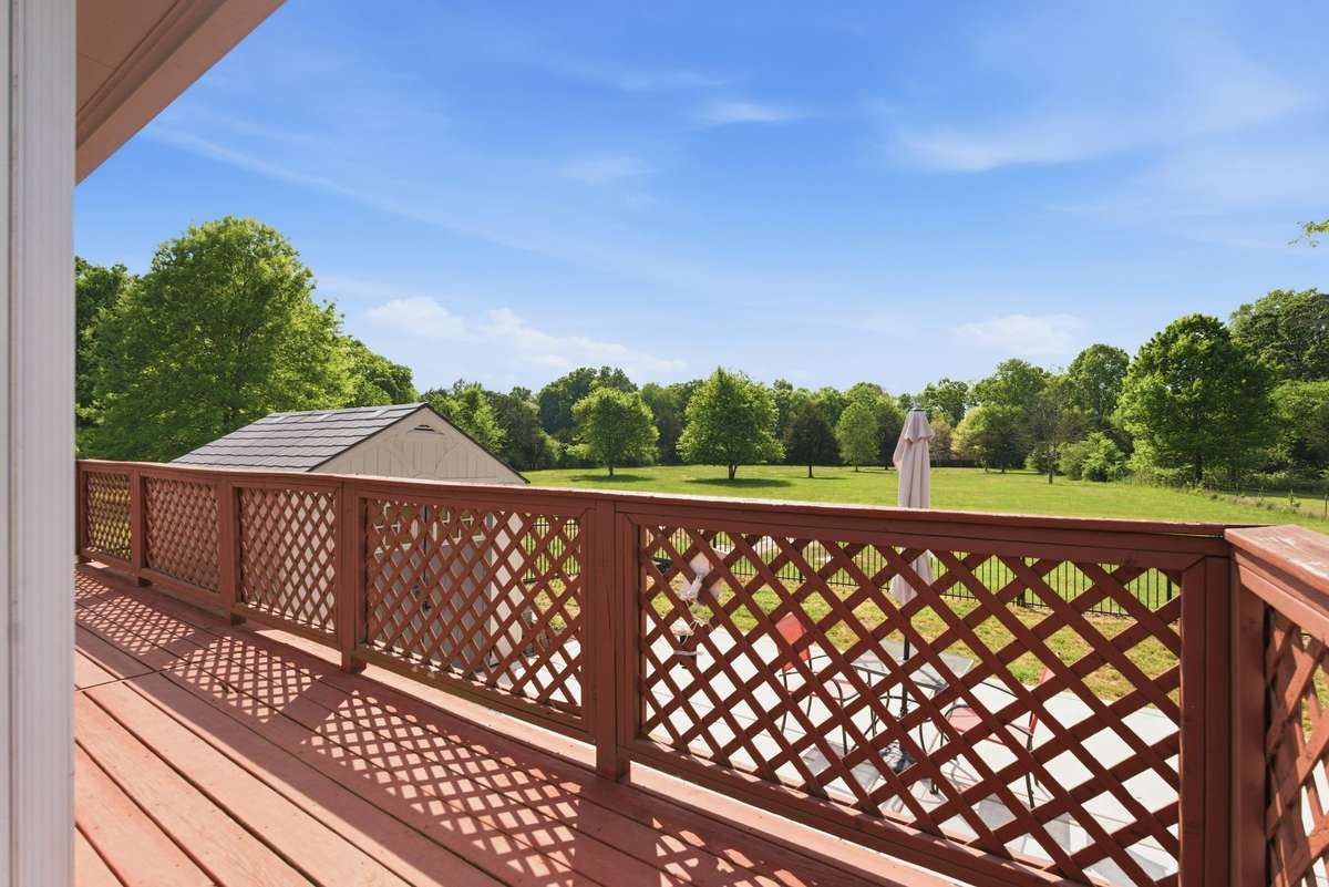 Deck space around sunroom addition.