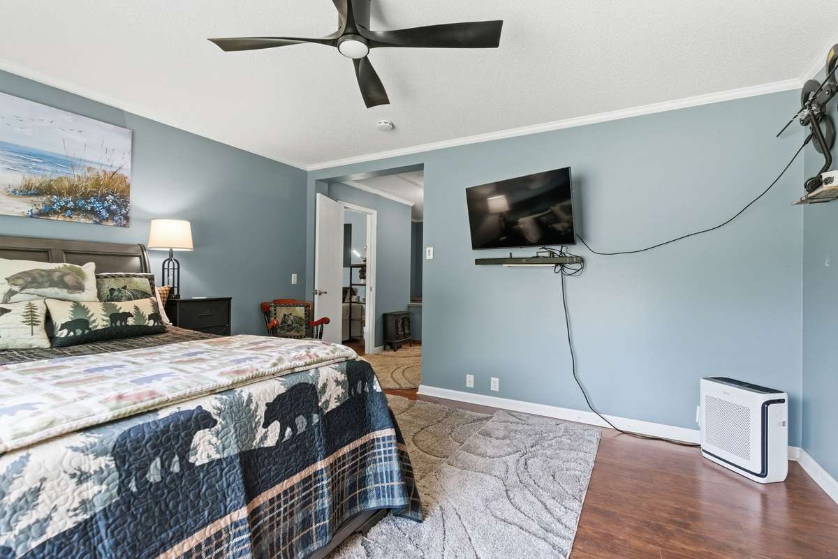 Master suite with walk in closet, bath w/ separate tub and shower, and separate water closet.