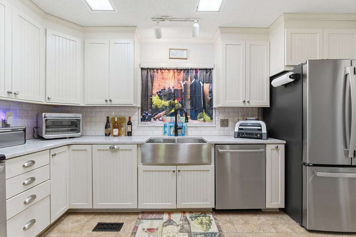 Pull out trash can and great cabinet space.