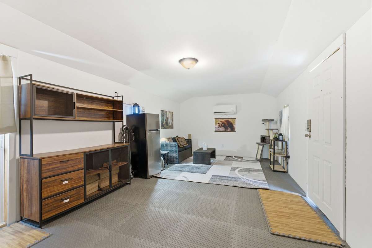 Inside the She-Shed/Man Cave! Such a cool bonus space with it's own breaker box and mini split unit for heating and AC!