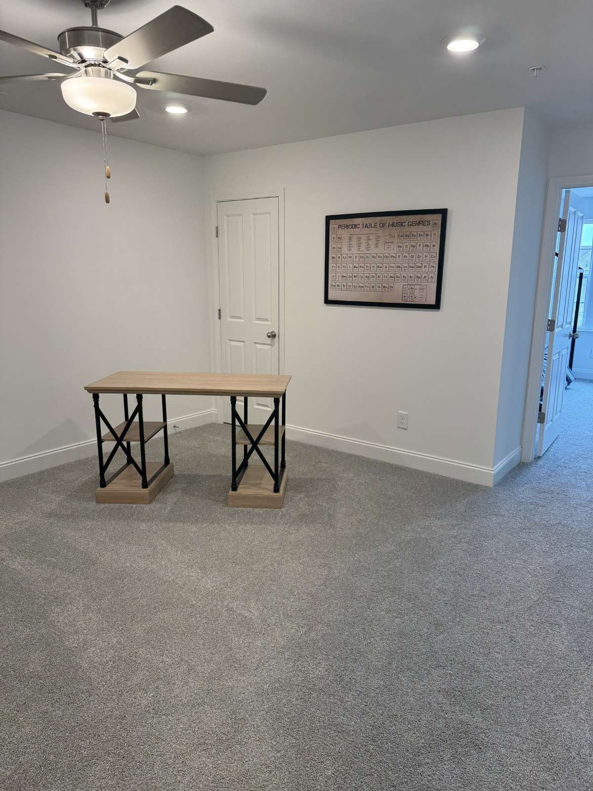 At the top of the stairs, you’ll find a loft area with a closet and two storage areas
