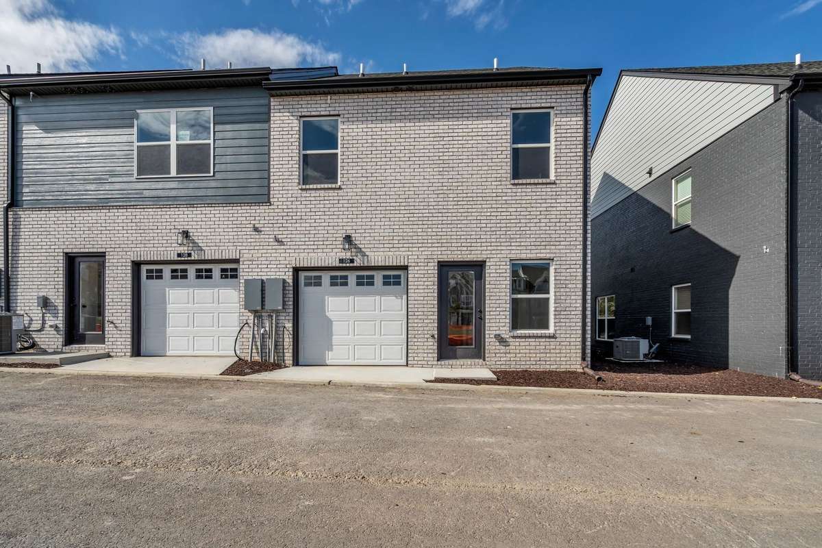 One car garage, and loads of additional parking in front of the home.
