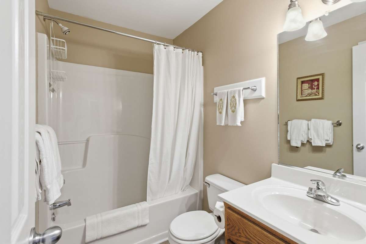 and shares a hall bath