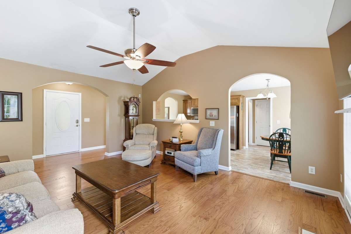 Newer hardwood floors and open to the kitchen