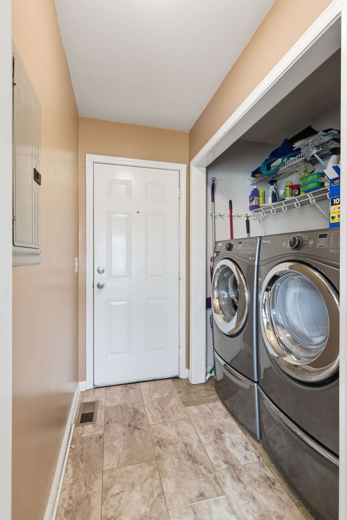 The laundry is in the back hallway