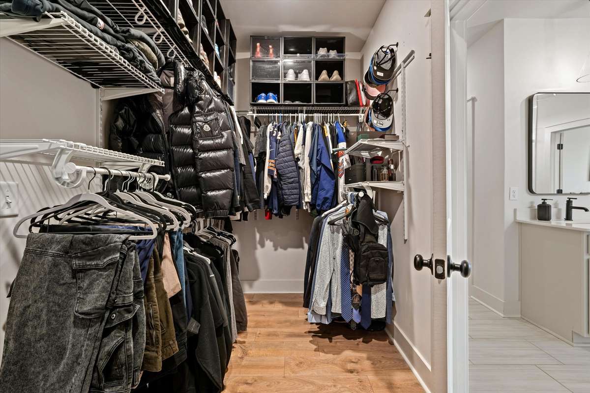 Large primary closet that connects to your laundry room