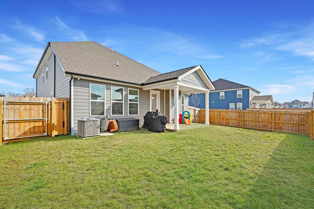 full fenced in with a covered patio and nice level yard